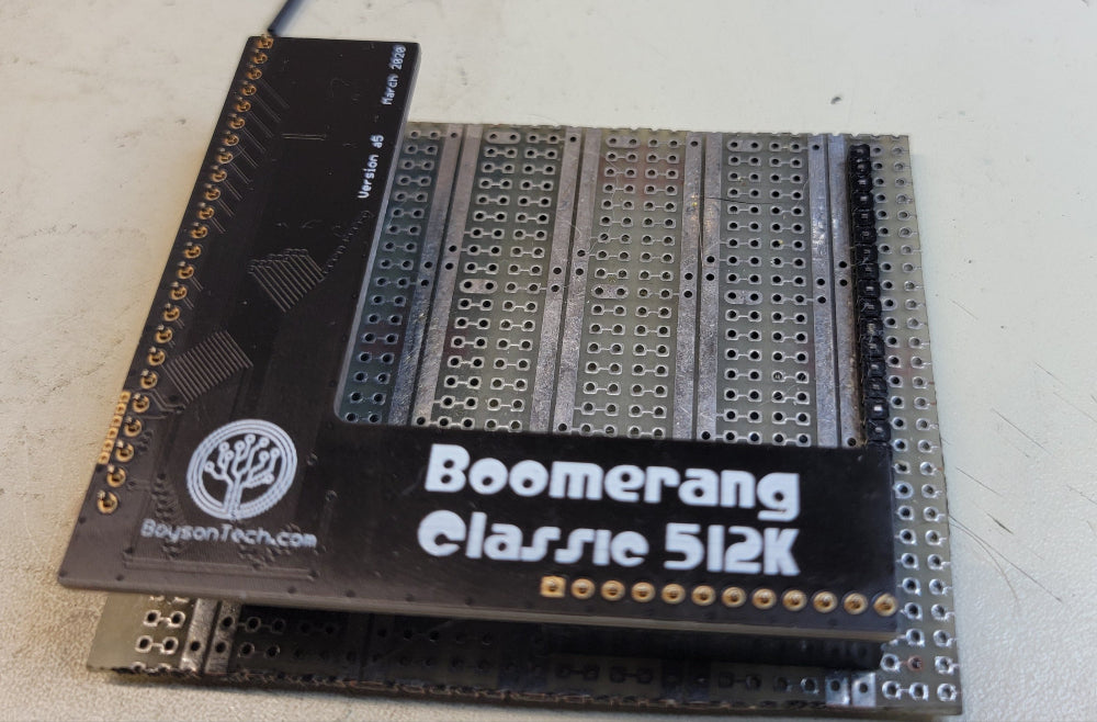 BoysonTech Boomerang Classic 512  RAM board sitting in final assembly solder jig.