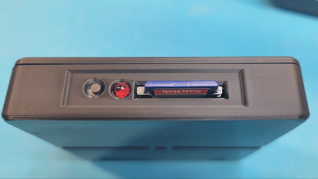BoysonTech version of the CoCo SDC  side view with SDC card installed. SDC card is NOT included with unit.