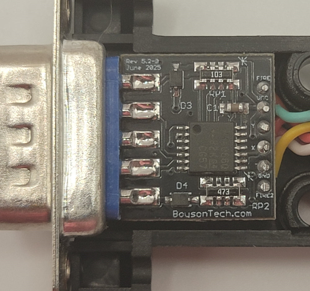 Paragon Joystick Adapter Closeup with DB9 hood removed. Adapter board measures 14mm x 14mm.